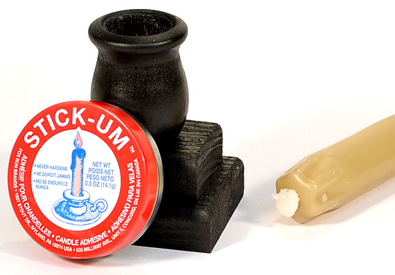 stick-um with taper holder