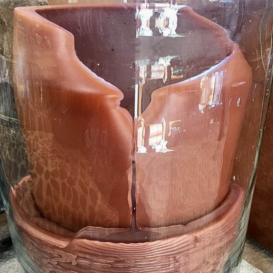 Pillar Candle Leaking in a Hurricane Glass